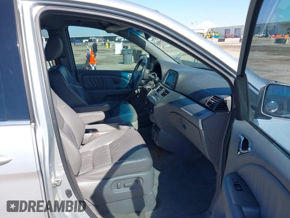 2010 Honda Odyssey Touring with VIN 5FNRL3H97AB015472, listed as a IAAI auction lot 41763680 with 144,309 mi miles. Bid and sale history available at carsss.com. Image 5.