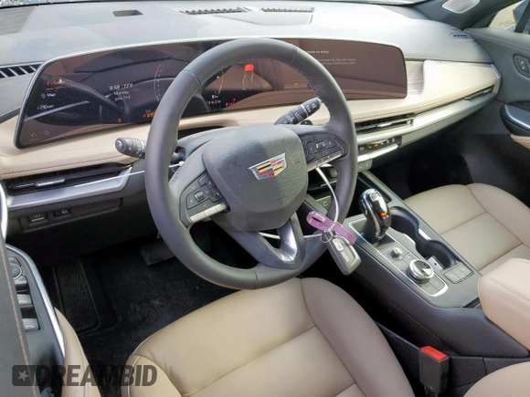 2024 Cadillac XT4 FWD Premium Luxury with VIN 1GYFZCR49RF248341, listed as a Copart auction lot 58586035 with 12,490 mi miles and Salvage title. Bid and sale history available at DreamBid. Image 8.