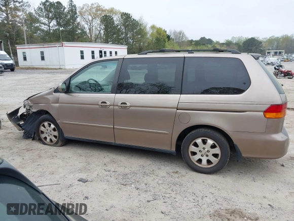 2004 Honda Odyssey EX with VIN 5FNRL18684B072343, listed as a IAAI auction lot 41945142 with 222,990 mi miles and . Bid and sale history available at DreamBid. Image 14.