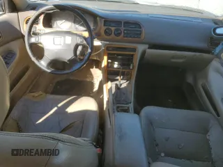 1995 Honda Accord EX with VIN 1HGCD5661SA012246, listed as a Copart auction lot 77007384 with 211,546 mi miles and Salvage Title. Bid and sale history available at DreamBid. Image 8.
