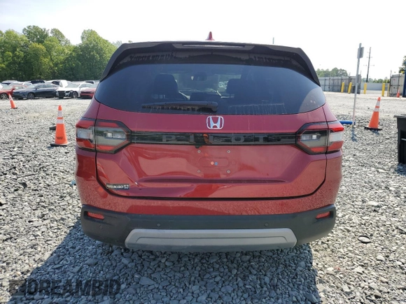2023 Honda Pilot EX-L with VIN 5FNYG2H40PB003512, listed as a Copart auction lot 55291795 with 17,493 mi miles and Salvage title. Bid and sale history available at DreamBid. Image 6.