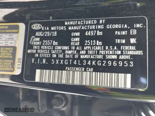 2019 Kia Optima S with VIN 5XXGT4L34KG296953, listed as a IAAI auction lot 42014999 with 64,968 mi miles. Bid and sale history available at carsss.com. Image 9.