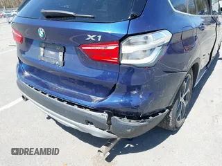 2017 BMW X1 xDrive28i with VIN WBXHT3C39H5F71525, listed as a IAAI auction lot 42050272 with 118,875 mi miles. Bid and sale history available at carsss.com. Image 6.