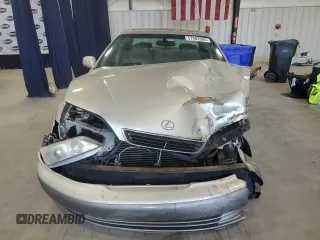 1999 Lexus ES 300 с VIN JT8BF28GXX0235471, выставлен на аукционе Copart как лот 57982605 с пробегом 187 958 миль миль и Списание • Salvage title. История ставок и продаж доступна на DreamBid. Изображение 5.