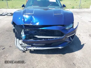2020 Ford Mustang EcoBoost with VIN 1FATP8UH2L5127689, listed as a IAAI auction lot 42219307 with 21,399 mi miles and . Bid and sale history available at DreamBid. Image 6.