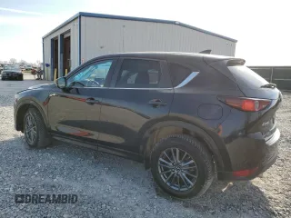 2019 Mazda CX-5 Touring with VIN JM3KFACM6K1562646, listed as a Copart auction lot 44153425 with 49,780 mi miles and Salvage Title. Bid and sale history available at carsss.com. Image 2.