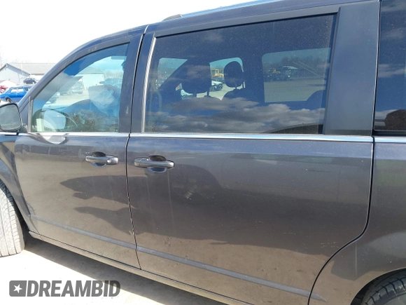 2019 Dodge Grand Caravan SXT with VIN 2C4RDGCG8KR513051, listed as a IAAI auction lot 42026581 with 118,145 mi miles and . Bid and sale history available at DreamBid. Image 14.