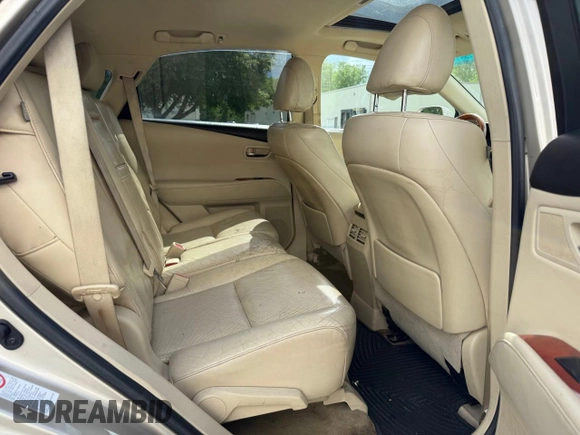 2012 Lexus RX 450h z VIN JTJBC1BA5C2427885, wystawiony jako Copart lot #58626695 z przebiegiem 166 056 mil mil oraz Szkoda całkowita • Salvage title. Historia ofert i sprzedaży dostępna na DreamBid. Obrazek 6.