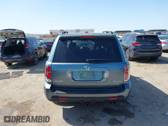 2006 Honda Pilot EX-L with VIN 2HKYF18506H521822, listed as a IAAI auction lot 42012612 with 187,946 mi miles and . Bid and sale history available at DreamBid. Image 16.