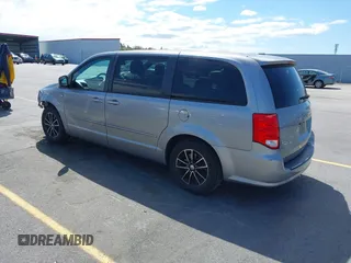2014 Dodge Grand Caravan SXT with VIN 2C4RDGCGXER261467, listed as a IAAI auction lot 41801810 with 97,322 mi miles and . Bid and sale history available at DreamBid. Image 3.