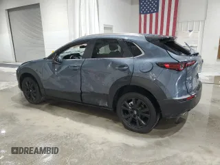 2024 Mazda CX-30 S Carbon Edition with VIN 3MVDMBCM7RM637315, listed as a Copart auction lot 55108695 with 8,476 mi miles and Salvage title. Bid and sale history available at DreamBid. Image 2.
