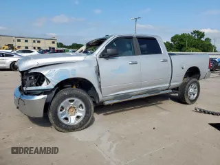 2014 Ram 2500 SLT with VIN 3C6TR5DT2EG205852, listed as a Copart auction lot 59514745 with 130,510 mi miles and Salvage title. Bid and sale history available at DreamBid. Image 1.
