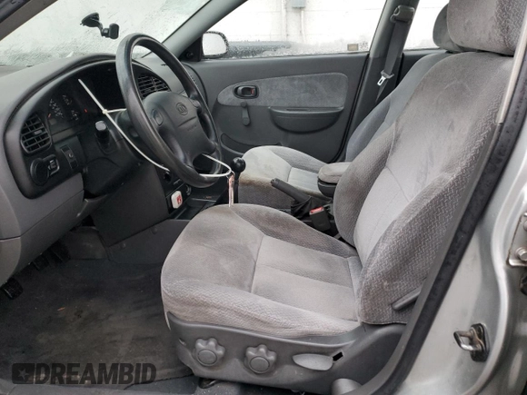 2004 Kia Spectra z VIN KNAFB121845304019, wystawiony jako Copart lot #86731644 z przebiegiem 150 252 mil mil oraz Szkoda całkowita • Salvage title. Historia ofert i sprzedaży dostępna na DreamBid. Obrazek 7.