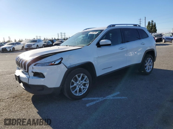 2015 Jeep Cherokee Latitude with VIN 1C4PJLCB9FW517961, listed as a Copart auction lot 41795735 with 131,089 mi miles and Salvage Title. Bid and sale history available at carsss.com. Image 1.