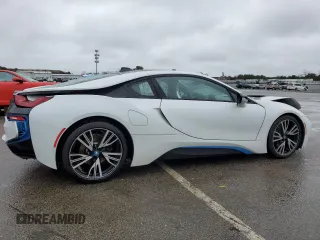 2015 BMW i8 z VIN WBY2Z2C53FV391673, wystawiony jako Copart lot #45827224 z przebiegiem 16 299 mil mil oraz . Historia ofert i sprzedaży dostępna na DreamBid. Obrazek 3.