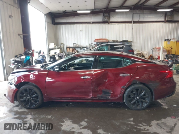 2017 Nissan Maxima SV z VIN 1N4AA6AP9HC416595, wystawiony jako IAAI lot #42385192 z przebiegiem 73 135 mil mil oraz . Historia ofert i sprzedaży dostępna na DreamBid. Obrazek 14.