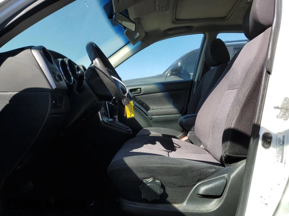 2004 Pontiac Vibe with VIN 5Y2SL62894Z413624, listed as a Copart auction lot 77539974 with 216,442 mi miles and Salvage Title. Bid and sale history available at carsss.com. Image 7.