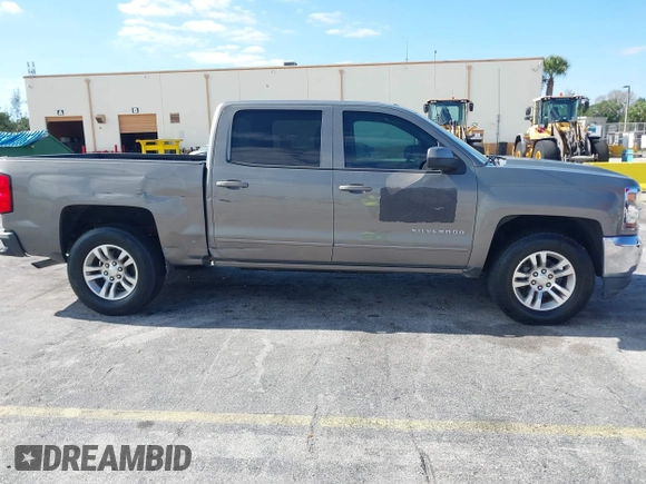 2017 Chevrolet Silverado 1500 LT with VIN 3GCPCREC1HG380406, listed as a IAAI auction lot 42031974 with 128,444 mi miles. Bid and sale history available at carsss.com. Image 13.