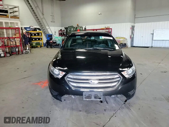 2015 Ford Taurus SEL with VIN 1FAHP2H89FG172117, listed as a Copart auction lot 49491575 with 134,922 mi miles and Salvage Title. Bid and sale history available at carsss.com. Image 11.