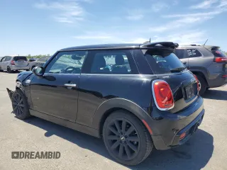 2017 MINI Hardtop Cooper S with VIN WMWXP7C52H2A44625, listed as a Copart auction lot 58011895 with 79,238 mi miles and Salvage title. Bid and sale history available at DreamBid. Image 2.