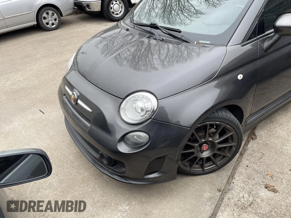 2014 FIAT 500 Abarth with VIN 3C3CFFJH8ET190132, listed as a IAAI auction lot 41574469 with 105,809 mi miles. Bid and sale history available at carsss.com. Image 2.