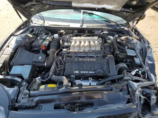 1995 Mitsubishi 3000GT z VIN JA3AM54J6SY013766, wystawiony jako Copart lot #75465424 z przebiegiem 103 869 mil mil oraz Szkoda całkowita • Salvage title. Historia ofert i sprzedaży dostępna na DreamBid. Obrazek 11.