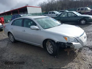 2010 Toyota Avalon XL with VIN 4T1BK3DB4AU357378, listed as a IAAI auction lot 38318161 with 74,523 mi miles and . Bid and sale history available at carsss.com. Image 1.