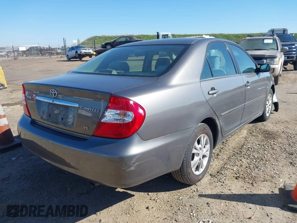 2004 Toyota Camry LE with VIN 4T1BF30K74U588368, listed as a IAAI auction lot 41659383 with 190,833 mi miles. Bid and sale history available at carsss.com. Image 4.