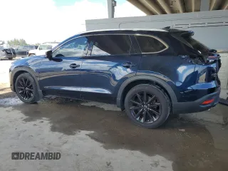2022 Mazda CX-9 Touring Plus with VIN JM3TCBAYXN0607056, listed as a Copart auction lot 61740065 with 59,281 mi miles and Salvage title. Bid and sale history available at DreamBid. Image 2.