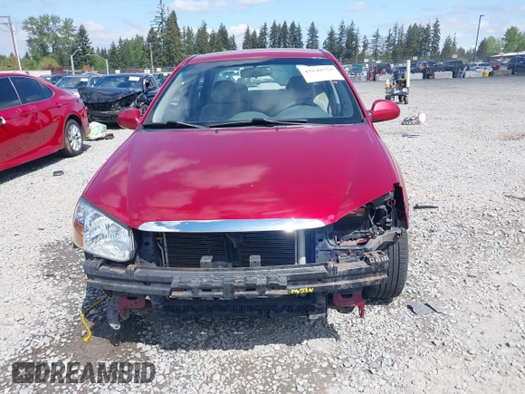 2009 Kia Spectra EX with VIN KNAFE222195661572, listed as a IAAI auction lot 42148750 with 137,773 mi miles. Bid and sale history available at carsss.com. Image 6.