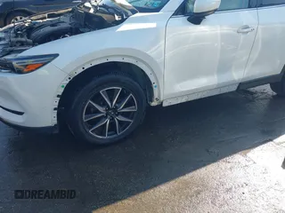 2018 Mazda CX-5 Grand Touring z VIN JM3KFBDM8J0420422, wystawiony jako IAAI lot #42188348 z przebiegiem 102 216 mil mil oraz . Historia ofert i sprzedaży dostępna na DreamBid. Obrazek 18.