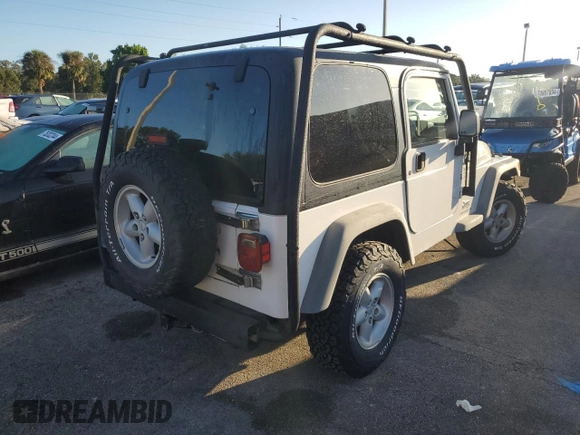 2006 Jeep Wrangler Sport Right Hand Drive with VIN 1J4F449SX6P733578, listed as a Copart auction lot 75113494 with 0 mi miles and Salvage Title. Bid and sale history available at carsss.com. Image 3.