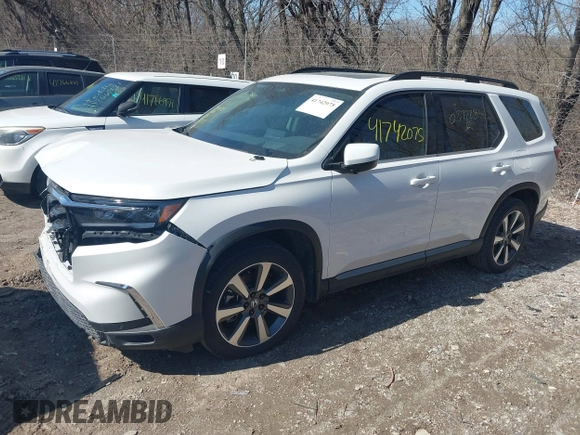 2023 Honda Pilot Elite with VIN 5FNYG1H81PB037228, listed as a IAAI auction lot 41742075 with 23,658 mi miles. Bid and sale history available at carsss.com. Image 17.