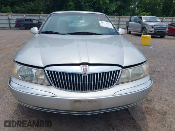 1999 Lincoln Continental с VIN 1LNHM97V7XY607937, выставлен на аукционе IAAI как лот 42473686 с пробегом 171 044 миль миль и . История ставок и продаж доступна на DreamBid. Изображение 6.