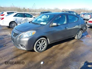 2014 Nissan Versa SV with VIN 3N1CN7AP9EL819833, listed as a IAAI auction lot 41351616 with 109,956 mi miles. Bid and sale history available at carsss.com. Image 2.