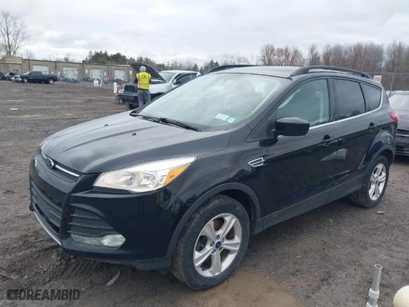 2016 Ford Escape SE with VIN 1FMCU9G97GUB49000, listed as a IAAI auction lot 41797005 with 104,690 mi miles. Bid and sale history available at carsss.com. Image 2.