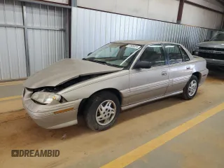 1998 Pontiac Grand Am SE z VIN 1G2NE52T3WM506391, wystawiony jako Copart lot #57699325 z przebiegiem 79 508 mil mil oraz Szkoda całkowita • Salvage title. Historia ofert i sprzedaży dostępna na DreamBid. Obrazek 1.