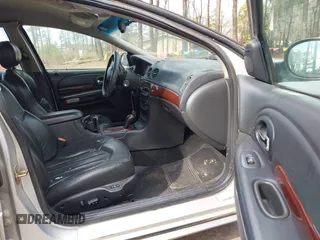 2001 Chrysler LHS z VIN 2C3HC56G81H540175, wystawiony jako IAAI lot #41751981 z przebiegiem 212 941 mil mil oraz . Historia ofert i sprzedaży dostępna na DreamBid. Obrazek 5.