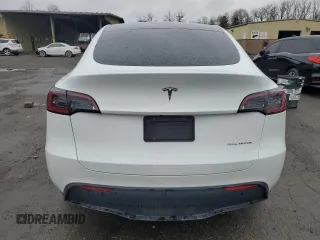 2023 Tesla Model Y Long Range with VIN 7SAYGDEEXPA122953, listed as a Copart auction lot 52627095 with Not Provided miles and Salvage Title. Bid and sale history available at DreamBid. Image 6.