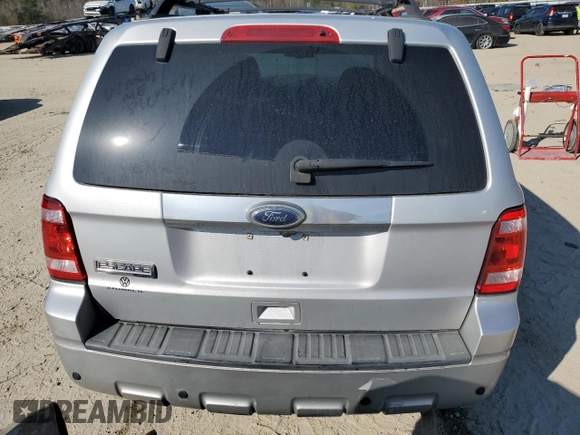 2010 Ford Escape Limited with VIN 1FMCU0E71AKC71285, listed as a Copart auction lot 61344164 with 163,471 mi miles and Salvage title. Bid and sale history available at DreamBid. Image 6.