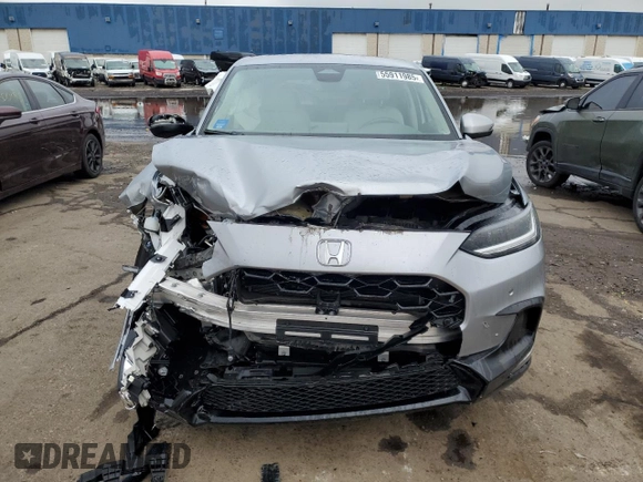 2024 Honda HR-V EX-L z VIN 3CZRZ2H79RM711744, wystawiony jako Copart lot #55911985 z przebiegiem 8 261 mil mil oraz Szkoda całkowita • Salvage title. Historia ofert i sprzedaży dostępna na DreamBid. Obrazek 5.