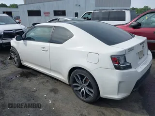 2014 Scion tC z VIN JTKJF5C77E3082073, wystawiony jako IAAI lot #42107615 z przebiegiem 223 895 mil mil oraz . Historia ofert i sprzedaży dostępna na DreamBid. Obrazek 3.