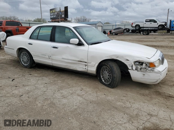 1999 Mercury Grand Marquis GS z VIN 2MEFM74W0XX670924, wystawiony jako Copart lot #51811055 z przebiegiem 176 559 mil mil oraz Szkoda całkowita • Salvage title. Historia ofert i sprzedaży dostępna na DreamBid. Obrazek 4.