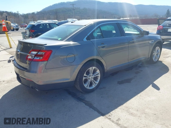 2014 Ford Taurus SEL with VIN 1FAHP2E82EG162676, listed as a IAAI auction lot 41795220 with 125,491 mi miles. Bid and sale history available at carsss.com. Image 4.