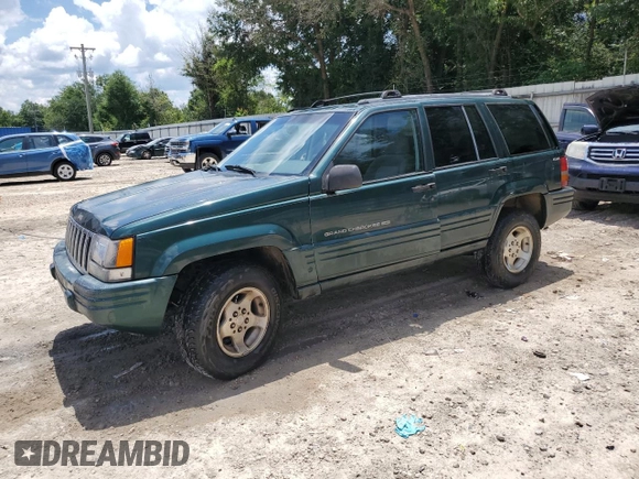 1998 Jeep Grand Cherokee Laredo with VIN 1J4GZ48S5WC289251, listed as a Copart auction lot 63594685 with 156,358 mi miles and Salvage title. Bid and sale history available at DreamBid. Image 1.