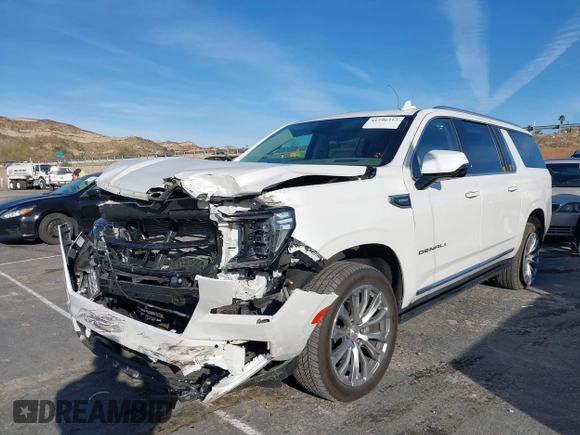 2023 GMC Yukon XL Denali with VIN 1GKS2JKT0PR478011, listed as a IAAI auction lot 41596312 with 21,286 mi miles. Bid and sale history available at carsss.com. Image 2.