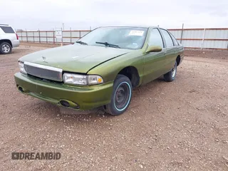 1994 Chevrolet Caprice Classic with VIN 1G1BL52W1RR158055, listed as a IAAI auction lot 41907431 with 133,280 mi miles. Bid and sale history available at carsss.com. Image 2.