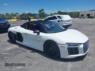 2017 Audi R8 z VIN WUAVACFX0H7903232, wystawiony jako IAAI lot #42247728 z przebiegiem 74 755 mil mil oraz . Historia ofert i sprzedaży dostępna na DreamBid. Obrazek 1.
