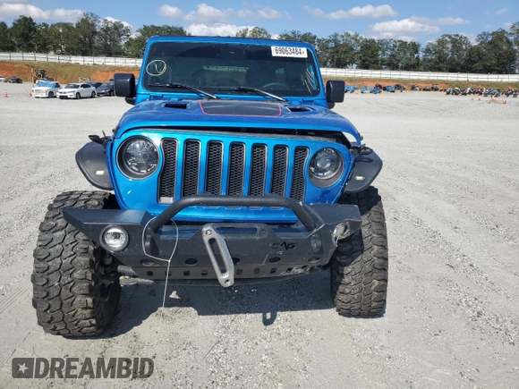 2023 Jeep Wrangler Rubicon with VIN 1C4HJXFN5PW504658, listed as a Copart auction lot 69063484 with 32,490 mi miles and Salvage title. Bid and sale history available at DreamBid. Image 5.