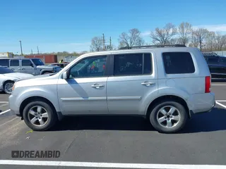 2011 Honda Pilot EX-L with VIN 5FNYF3H6XBB055684, listed as a IAAI auction lot 41820076 with 227,655 mi miles and . Bid and sale history available at DreamBid. Image 14.